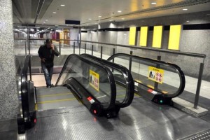 A passenger makes his way up an escalator. Photograph: Mehdi Shirazi/Maktoob Business 