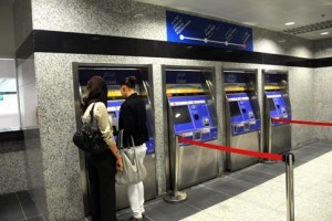 Two women purchase tickets for the metro. The service runs from 8 a.m. to 10 p.m. daily with tickets costing 15 dirhams for a single journey and 25 dirhams for a round trip. Photograph: Mehdi Shirazi/Maktoob Business 