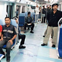 © XPRESS/Virendra Saklani. Model run: ‘Passengers’ check out the replica of the Metro at the Global Village two years back