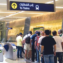 The first ride: Commuters wait to have their tickets ‘read’ before boarding the Metro on the first day of its public launch at the Union Square station in Dubai © XPRESS/Virendra Saklani 