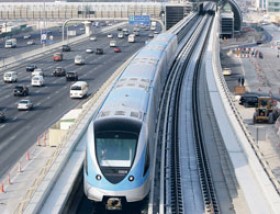 Hadrian Hernandez/Gulf News A Metro train makes a trial run on the Red Line on Shaikh Zayed Road. The Metro, which opens today, will help commuters reach strategic areas of the city, and will also branch out into the suburbs through future extensions.