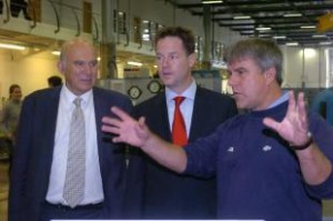 Vince Cable and Nick Clegg with Adie Webb, operations manager 