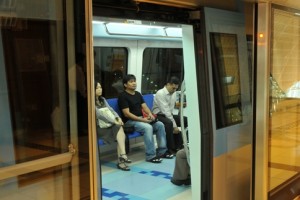 Most seats were taken, the isles were congested and passengers were either reading a book, flicking through a newspaper or listening to their iPods. Photograph: Peter Harrison/Maktoob News