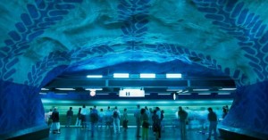 Mural paintings brighten a station of the Stockholm Metro, or Tunnelbana. The first part of the network was opened in 1950, and 100 stations are currently in use.