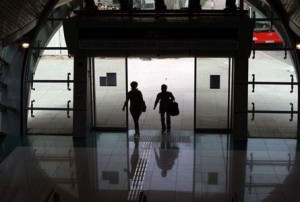 Two women walk into the Marina Metro Station in Dubai. Randi Sokoloff / The National