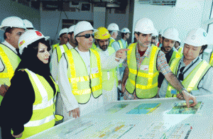 Al Tayer inspecting the work progress in the metro depot at Al Qusais.