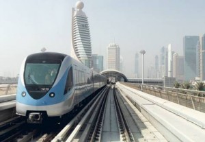     *  A Dubai Metro train zooms along the Red Line. The UAE and Saudi Arabia dominate spending on rail, road and public transportation.