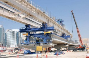 2007 Workers are busy laying part of the track of the Dubai Metro. The Red Line extends 52km and comprises 29 stations (4 underground and 25 elevated).