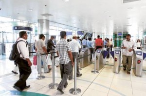     *  Image Credit: XPRESS/Megan Hirons Mahon     * Metro goers exit at the Rashidiya Station.