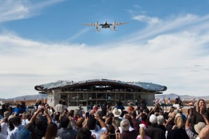   Stephen Attenborough, a director at Virgin Galactic, says Abu Dhabi could be the location for the company’s first non-US spaceport. Above, the Virgin WhiteKnightTwo performs a flyover during an event commemorating the completion of the spaceport runway in New Mexico.  Christ Chavez / Bloomberg