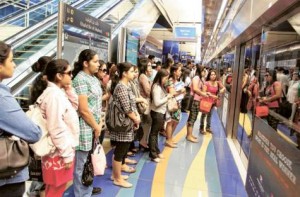     *  Image Credit: Pankaj Sharma/Gulf News     * Commuters at Khalid Bin Al Waleed Metro Station wait for the train. Passengers rode the Metro, public buses and water taxis for free as part of the Roads and Transport Authority annual Public Transport Day.