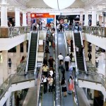 Shoppers such as these at Deira City Centre in Dubai view malls as a source of entertainment and socialising.  Amy Leang / The National