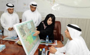     *  Image Credit: Oliver Clarke/Gulf News     * Mattar Al Tayer and other officials check the layout map of Al Khail Road.