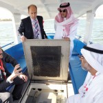 Guy Wolfensberger explains to officials about Grove Boats during WFES 2012 at the Abu Dhabi National Exhibition Centre. — KT photo by Nezar Balout