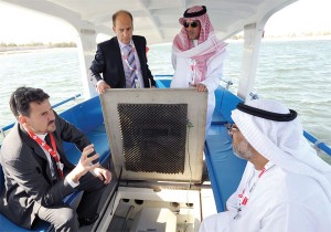 Guy Wolfensberger explains to officials about Grove Boats during WFES 2012 at the Abu Dhabi National Exhibition Centre. — KT photo by Nezar Balout