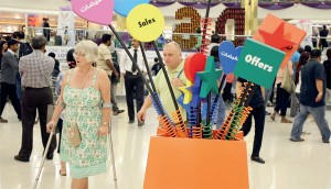 A woman on crutches enjoying shopping at Deira City Centre. — KT photo by M.Sajjad