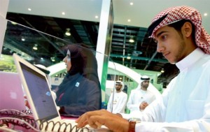 An Emirati fills an online job application form at Careers UAE . — KT photo by Rahul Gajjar