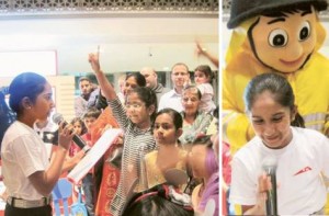     *  Image Credit: Pictures courtesy: Disha Bobby     * Eager participants raise hands to answer questions at a road safety quiz held for shoppers at the Dubai Festival City.