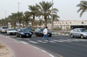      Image Credit: Pankaj Sharma/Gulf News     Vehicles negotiate a speed bump at International City.