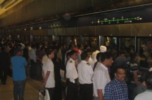      Image Credit:     Survival of the fittest Residents find it very difficult to use the Metro during rush hours as they are jostled in the melee either to get into the trains or off.