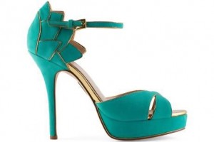 A kelly green and gold shoe from Madonna's collection. Courtesy Madonna: Truth or Dare