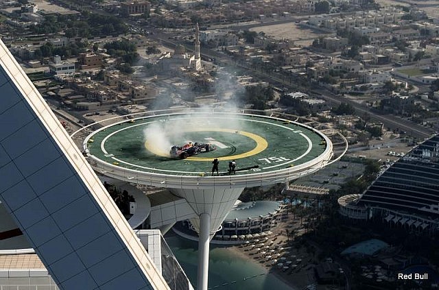 Red Bull stage F1 car stunt atop Dubai's Burj Al Arab ...