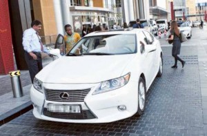 Image Credit: Virendra Saklani/Gulf News Visitors using one of the recently launched luxury taxies by RTA at Dubai mall.