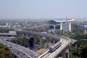 A metro rail train travels between the districts of Alandur and Koyabedu in Chennai. AFP