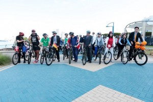 Patrizio Fondi, fifth right, European Union ambassador to the UAE, is joined by other ambassadors and staff members from 13 EU embassies on the Corniche on Tuesday to cycle to work. Christopher Pike / The National