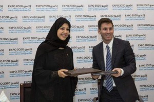 Reem Ibrahim Al Hashemi seen with Lionel Messi, who signed as Global Ambassador of Expo 2020 Dubai. (Supplied photo)