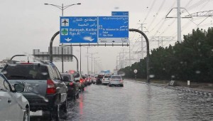 Traffic moves at a snails pace on Al Khan Road that was flooded due to the sudden downpour that occurred on Tuesday morning. - Photo by Juidin Bernarrd